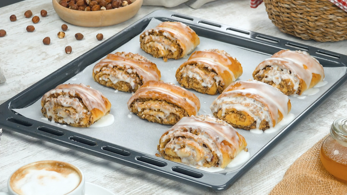 Pillowy German Nut Rolls With A Hazelnut Filling And Lemon Icing